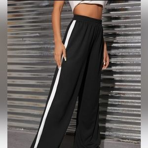 BP black joggers high waisted with pockets. Bottom flares. NWT size XS